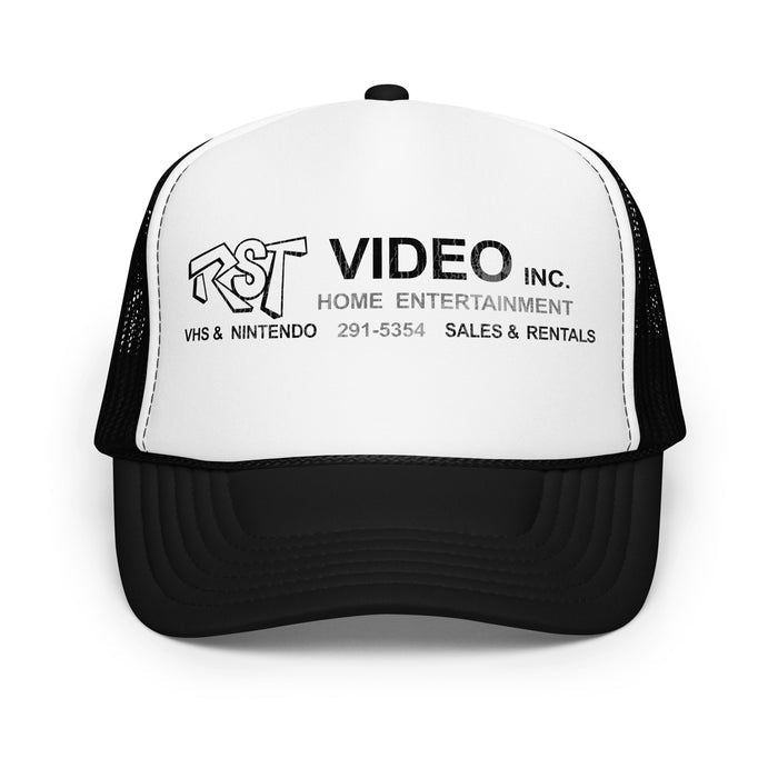 A vintage black and white foam trucker hat that says "RST Video Inc. Home Entertainment", "VHS & Nintendo", the number "291-5354", and "Sales & Rentals". Made famous by Kevin Smith and referenced in his movie comedy action film 'Clerks".