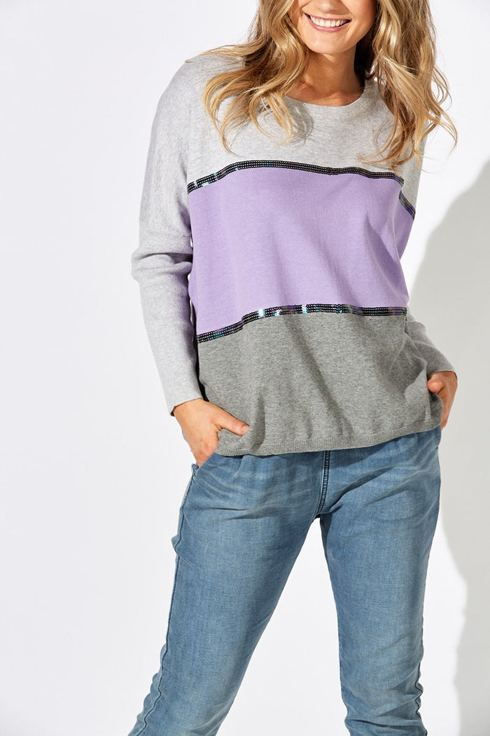 lilac knit sweater with grey colour block panels and metallic stripe