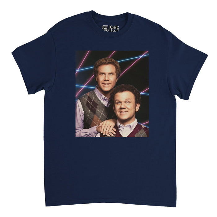 A vintage, souvenir navy colored short sleeved t-shirt with the photo of two men with curly hair, lilac shirts, and sweater vests against a background of pink and blue laser beams. In reference to the iconic 2008 comedy film "Step Brothers" which stars Will Ferrell and Adam Scott as Brennan and Derek, two middle aged men who still live at home with their parents and eventually have to become roommates.