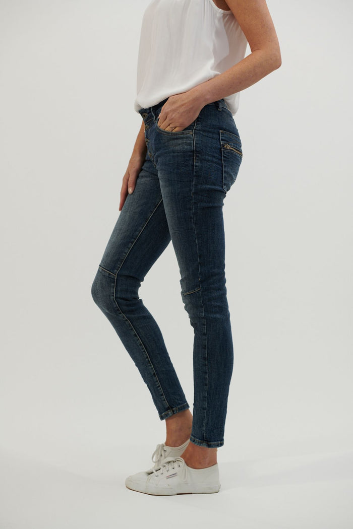 women’s skinny jean in washed blue denim
