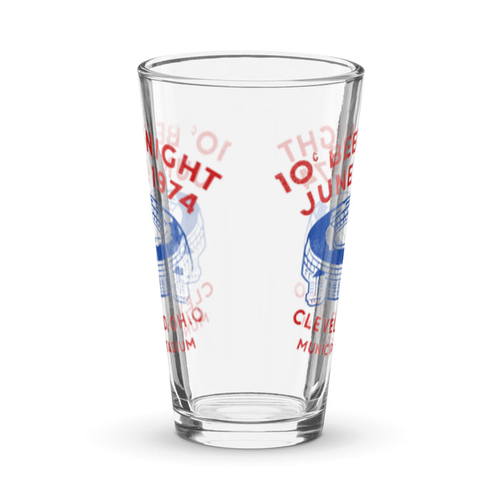 The front of a 16 oz vintage, 80s style shaker pint glass that says on both sides "10 ¢ Beer Night", the date "June 4, 1974", location "Cleveland Ohio", and "Municipal Stadium" in red around a blue graphic of Cleveland Stadium. In reference to the infamous promotion called Ten Cent Beer Night which ruined an MLB Cleveland Indians vs. Texas Rangers game due to cheep beer leaving audience members overly drunk and rowdy.