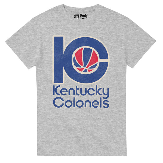 A vintage heather gray souvenir Kentucky Colonels t-shirt with the KC logo including a red/blue basketball. In reference to the legendary former American Basketball Association (ABA) team based in Louisville, Kentucky from the 1960s and 1970s, known for their high winning percentage, playing at the Louisville Convention Center, now The Gardens, one of only two teams (the Indiana Pacers being the other) who played during the entire duration of the ABA league and didn't fold, relocate, or change t