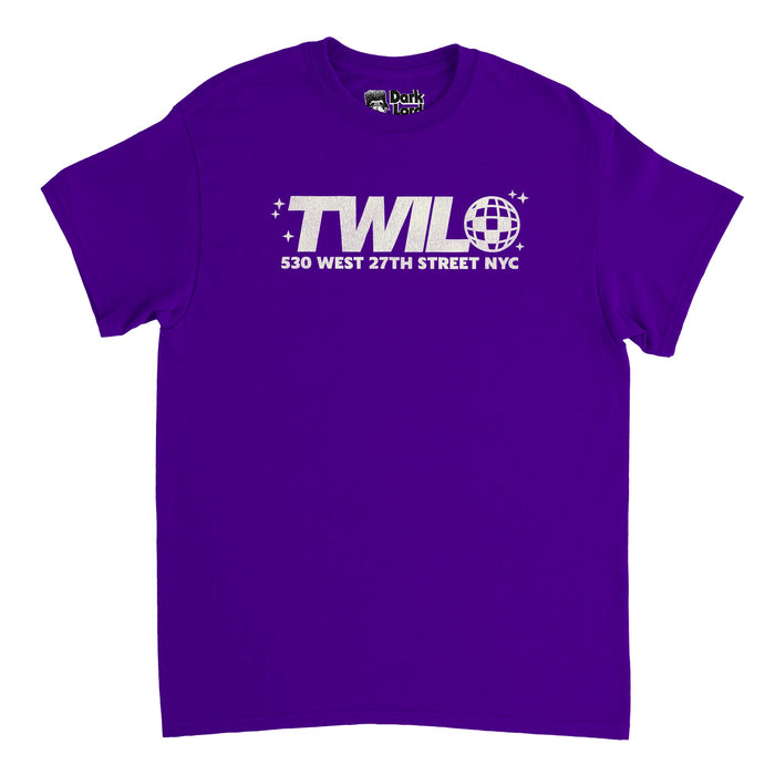 A souvenir, vintage Twilo t-shirt in the color purple that says 'TWILO' with the image of a disco ball for the "O" and the address '530 West 27th Street NYC', with a couple four pointed stars decorating both sides of the name. In reference to the absolutely iconic nightclub frequented by New Yorkers for almost fifty years, from 1950-2001, located in Chelsea, a popular star of the Manhattan night life scene.
