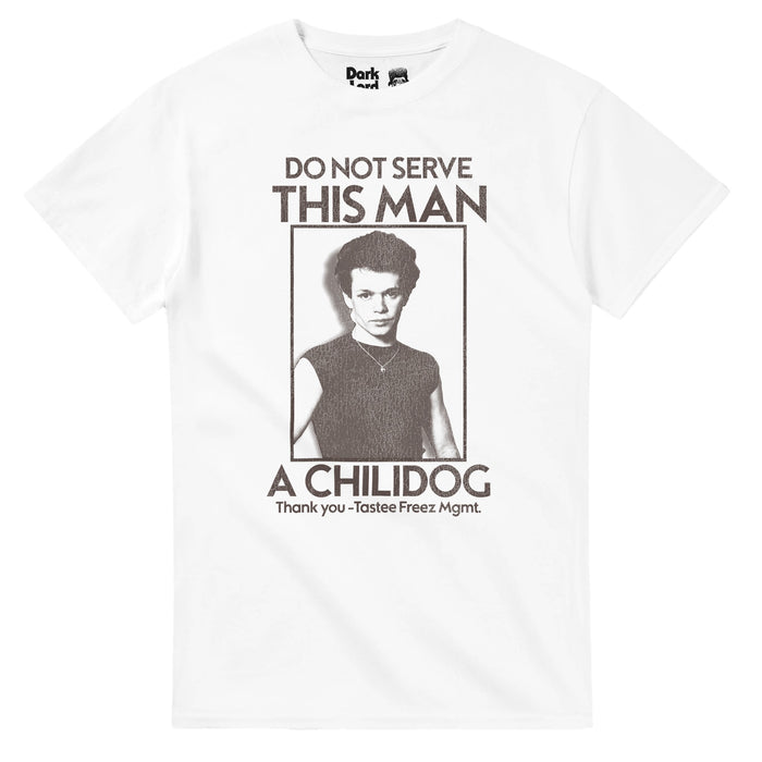 A white colored, 80s style vintage t-shirt that says "DO NOT SERVE THIS MAN A CHILIDOG, Thank you - Tastee Freez Mgmt." with an image of iconic rock and folk singer and songwriter John Cougar Mellencamp in a black and white image, surrounded by a rectangular line. References Mellencamp's famous hit song "Jack & Diane" which has lyrics "Suckin' on a chili dog outside the Tastee Freez" and the music video shows Diane sitting on Jacky's lap with a chilidog in her hands.