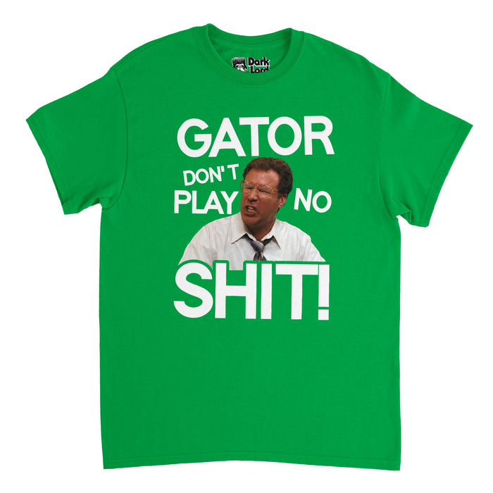 A vintage, 80s style irish green colored t-shirt that says 'Gator Don't Play No Shit!' around the image of a red faced Will Ferrell, referencing the famous, hilarious quote spoken by character Detective Allen Gamble to Sheila Gamble, played by Eva Mendes, in the iconic comedic movie "The Other Guys".