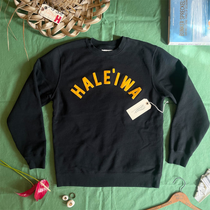 HALE`IWA- athletic gold on black