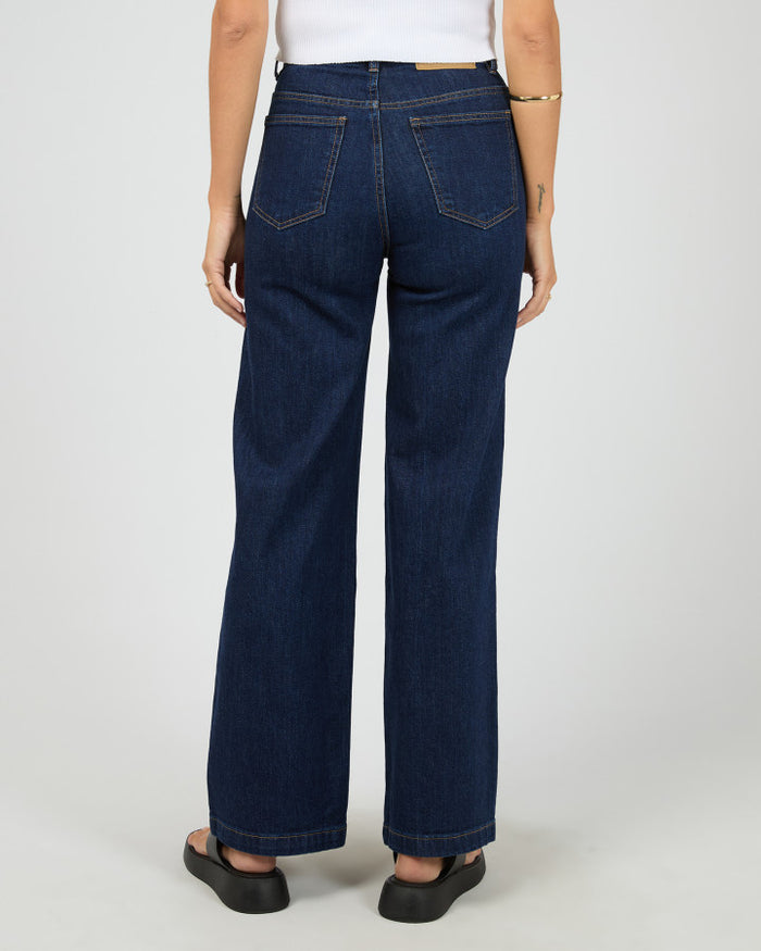 Dark indigo denim jeans with full-length fit | All About Eve