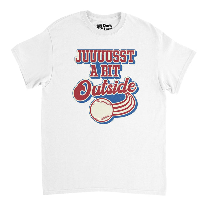 A retro, 70s style white t-shirt that says "Juuuusst a bit outside" in red, white, and blue, the image of a baseball speeding by with a motion lines of red stripes. References the famous line said by the legendary actor, professional MLB catcher, and broadcaster Bob Ueker, nicknamed "Mr. Baseball", in the 1989 comedy sports movie "Major League" where he played Harry Doyle, an announcer for the Cleveland Indians.