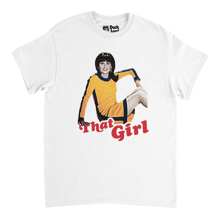 A vintage, souvenir "That Girl" t-shirt in the color white with the image of actress Marlo Thomas in a navy and yellow dress posed above the words "That Girl", referencing the iconic American television sitcom from the 60s and 70s which starred Marlo Thomas as title character, Ann Marie, an unmarried girl living and working in New York City.