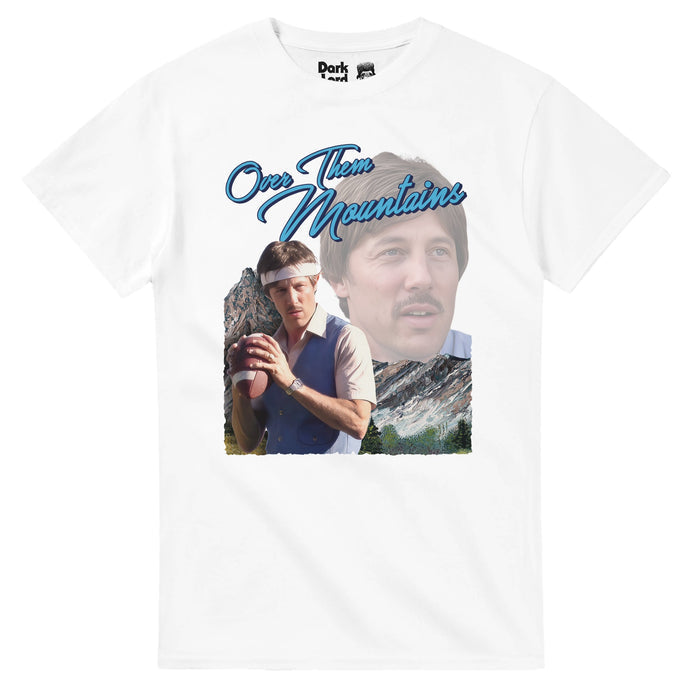 A retro, white colored 80s style short sleeved t-shirt with two images of the character Uncle Rico - one of him staring out into the distance, another of him wearing a white headband, ready to throw a football, a majestic mountain behind him. Says "Over Them Mountains" in bright blue cursive text, a reference to the quote Uncle Rico, played by famous actor Jon Gries, says in the comedy indie film Napoleon Dynamite: "How much you wanna make a bet I can throw a football over them mountains?"