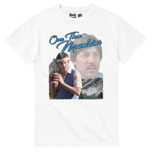 A retro, white colored 80s style short sleeved t-shirt with two images of the character Uncle Rico - one of him staring out into the distance, another of him wearing a white headband, ready to throw a football, a majestic mountain behind him. Says "Over Them Mountains" in bright blue cursive text, a reference to the quote Uncle Rico, played by famous actor Jon Gries, says in the comedy indie film Napoleon Dynamite: "How much you wanna make a bet I can throw a football over them mountains?"