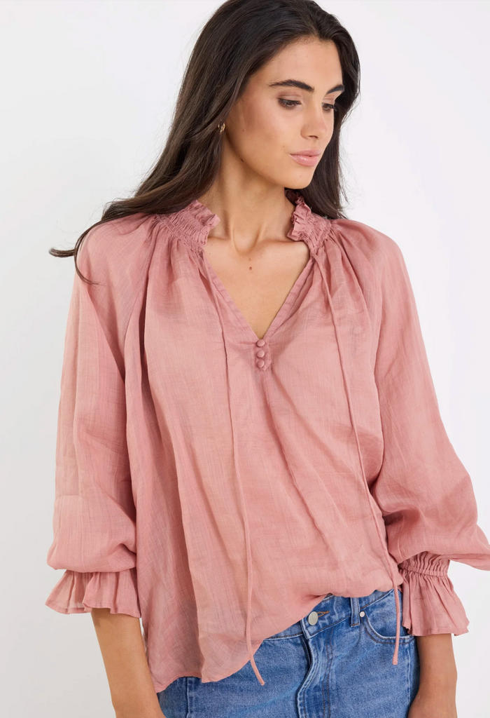 Among the Brave Odyssey Shirred Neck Button Long Sleeve Top in Blush | Women's Tops | Gretel Lane