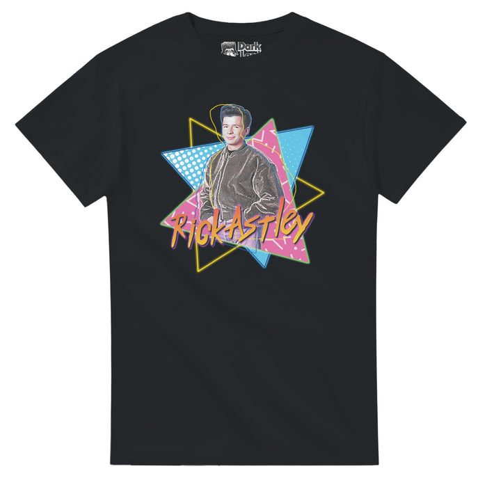 A black colored souvenir 90s style t-shirt with an image of the young Rick Astley and his name against a colorful backdrop of three overlapping triangles, one outline in yellow, one filled in blue, and one in pink with patterns. References the iconic English singer and songwriter immortalized by his 1987 worldwide hit song "Never Gonna Give You Up", often referenced in pop culture by the term "rickrolled", known for his album "Whenever You Need Somebody" and songs Together Forever & Take Me To Y