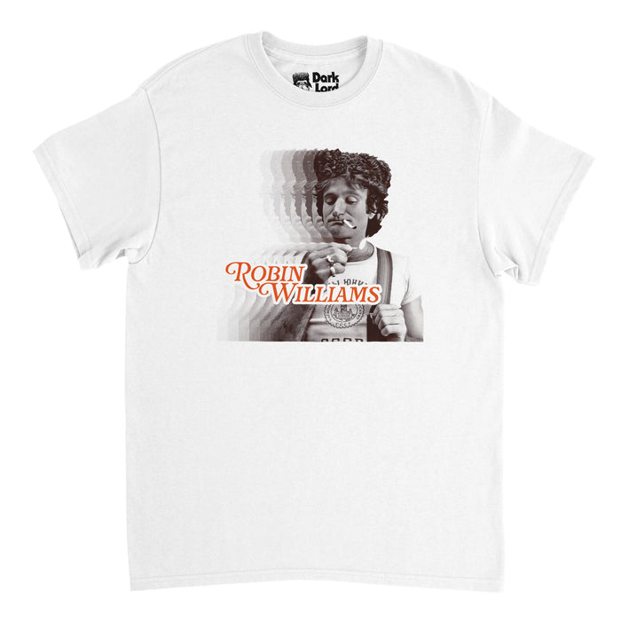 A vintage, 70s style white colored short sleeved t-shirt with a famous image of Robin Williams, iconic comedian, actor, and artist, reflected multiple times into the left side, with his curls framing his face, a cigarette in his mouth, wearing suspenders, rings on his fingers. The shirt says "Robin Williams" in capitalized, orange letters.
