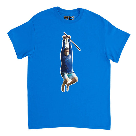 A souvenir royal blue 90s style t-shirt that has a man with a determined expression hanging off of a zipline, wearing a soaking wet blue long sleeved shirt and swim trunks. References the episode "Summer Loving Farewell" from the hilarious, famous streaming show "I Think You Should Leave" in which Megan, played by Jessica Parker Kennedy, tells Ronnie, played by Tim Robinson, "I feel like you're just here for the zipline".