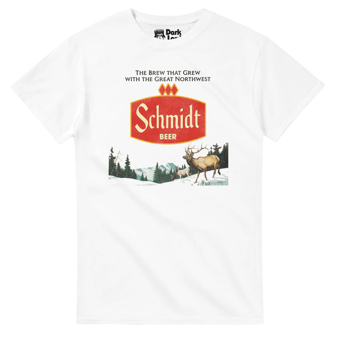 A white colored, retro souvenir t-shirt that says "The Brew That Grew with the Great Northwest" above an image of the red logo for Schmidt Beer and an image of the wilderness complete with multiple deer, one with huge antlers, mountains, snow, and pine tree forests. References the macro lager started in Minnesota, sold from 1860-1987, known as the "Official beer of the American sportsman", the brand eventually sold to Pabst.