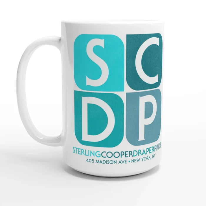A vintage mug in the color white with four letters arranged in the emblem of company SCDP, Sterling Cooper Draper Price, located at 405 Madison Ave, New York, NY. References the iconic period drama series "Man Men" following the career of Don Draper, played by iconic actor Jon Hamm, in his work in the advertising sector in New York City.