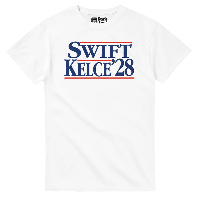 A retro, white colored 80s style t-shirt that says SWIFT KELCE '28 in navy blue text surrounded by red lines. References a funny pop culture reference of Taylor Swift and Travis Kelce for president 2028, the incredibly famous power couple, now engaged to be married, Taylor Swift known for her music career in pop and country, and Travis Kelce for his career in the NFL as a football tight end for the Kansas City Chiefs, multiple NFL wins under his belt.