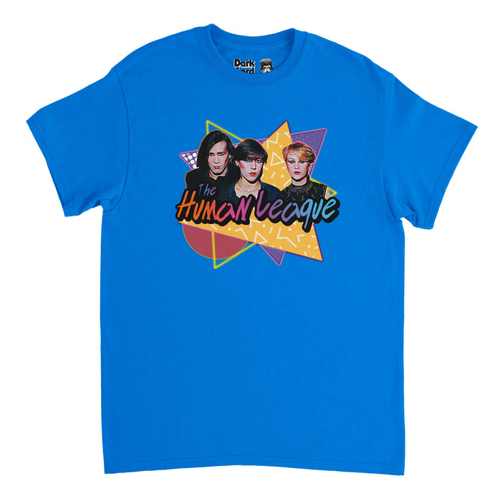 A bright blue vintage 80s style t-shirt with multiple shapes overlapping each other, yellow and purple triangles and a red half circle, with three iconic band members pasted on top, the words "The Human League" written in hombre blue, purple, orange, and pink colors. References the English synth band of the same name, starring Philip Oakey, Joanne Catherall, and Susan Ann Sulley, with hits like "Don't You Want Me", "Human", "The Sound of the Crowd", & "Being Boiled" and hit albums like "Dare".