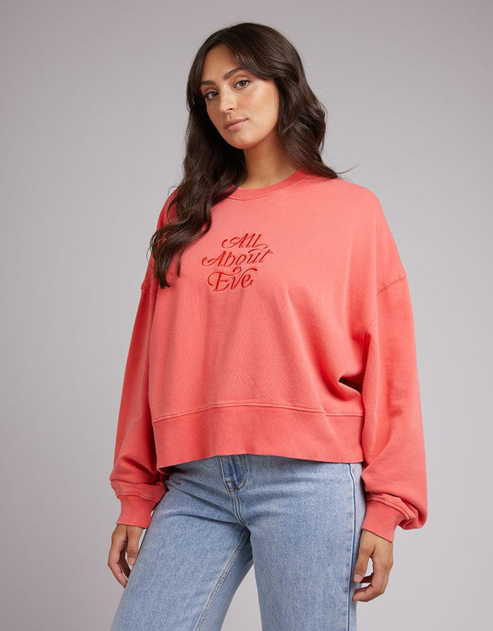 women's peach sweatshirt with tonal embroidered logo | All About Eve