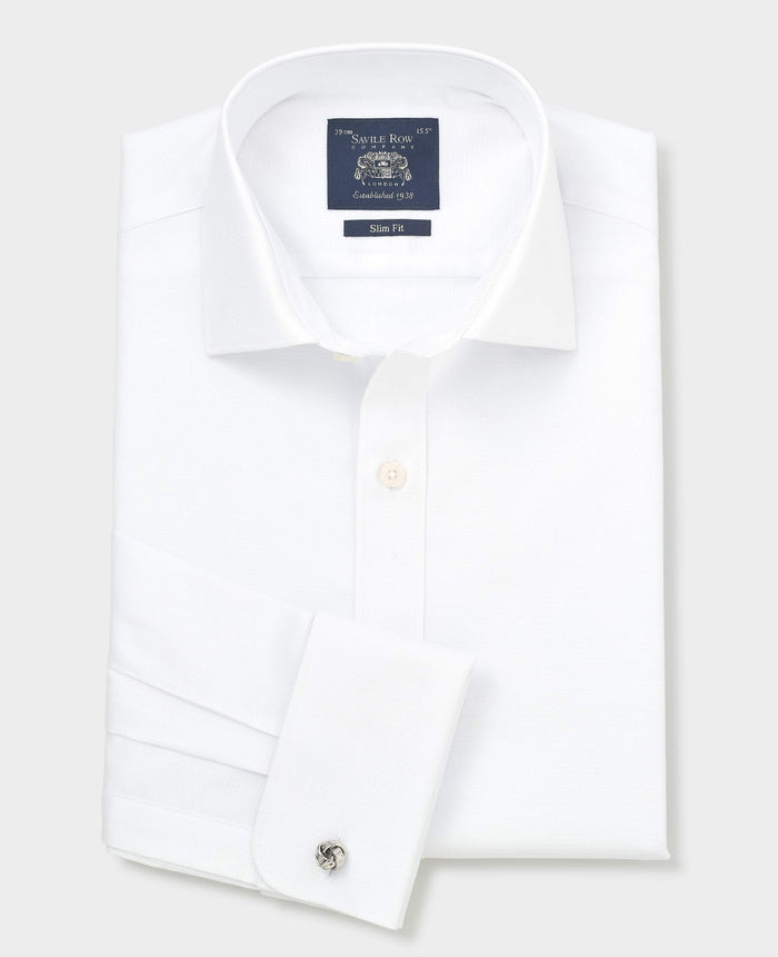 White dress shirt with cufflinks on a light gray background